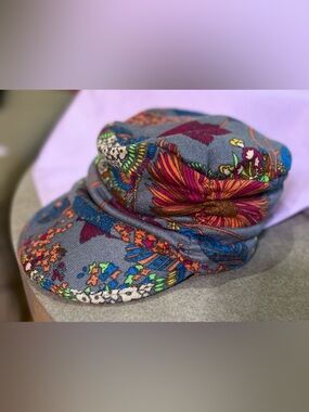 Newsboy Style Cap-Colorful Textured Floral Pattern on Gray Background.